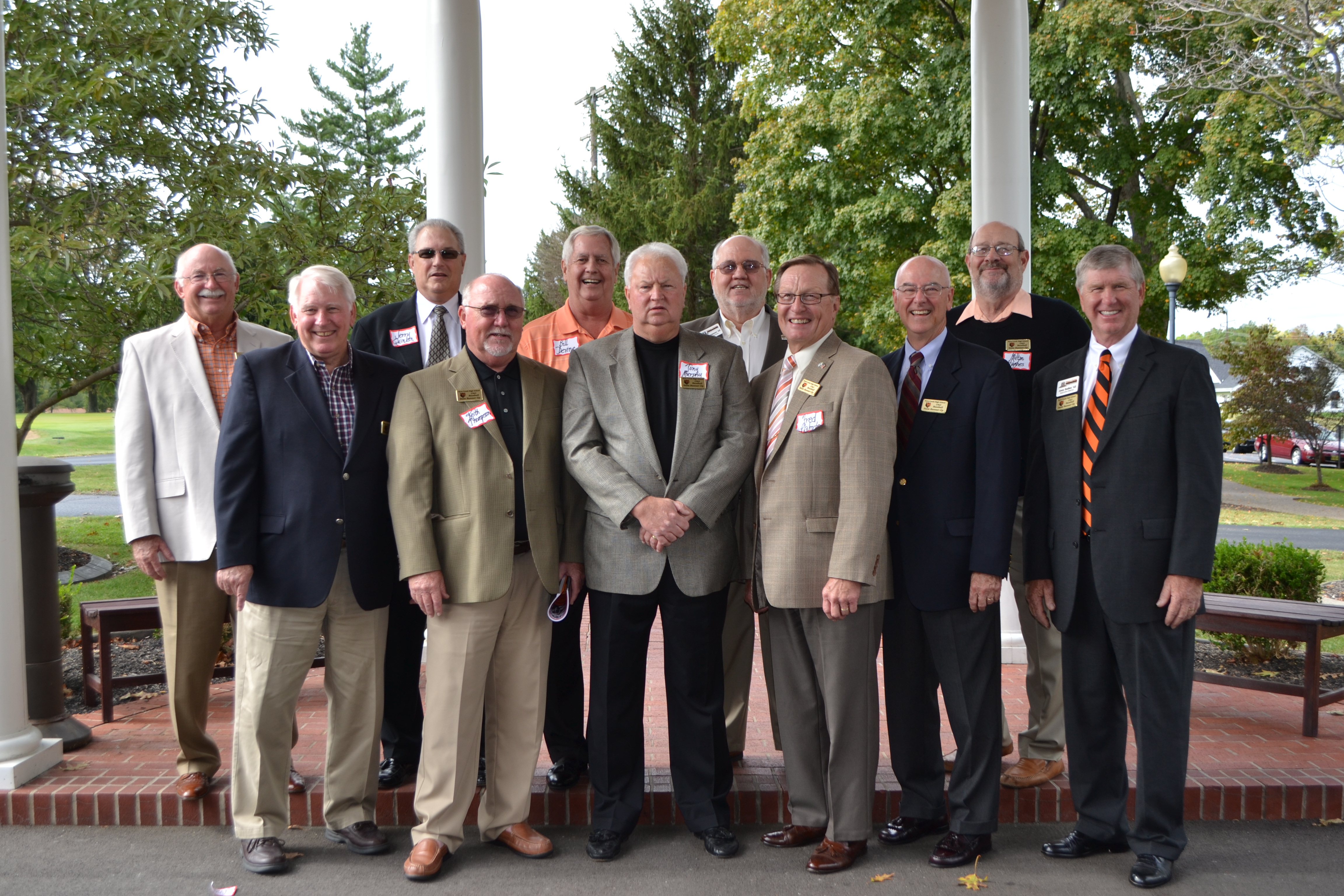 Team members standing together at a reunion